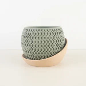 The 3DChicPot Echo Spiral Planter features an S-curve spiral lattice​ with a flowing, wave-like rhythm. Paired with a matching beige saucer, it blends decorative style and practicality. As side-light filters through the cutouts, it casts dynamic shadows throughout the day. Available in custom colors/sizes (3D printed to order), it’s perfect for elevating indoor plant displays.
